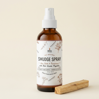 Soul Sticks Palo Santo and Sandalwood spray beside one Palo Santo stick